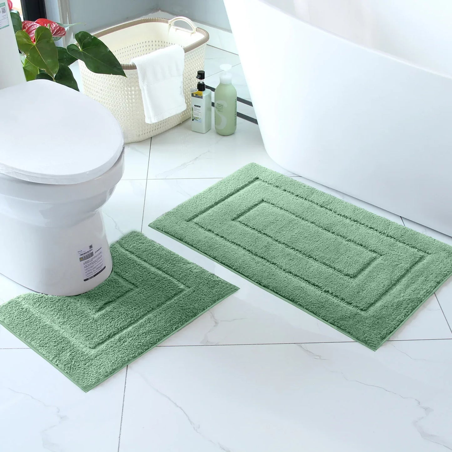 Soft and cozy plush bathroom floor mat set in green, perfect for adding comfort to your bathroom