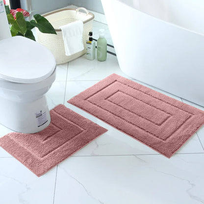 Soft pink plush bathroom floor mat set for added comfort and style in your bathroom