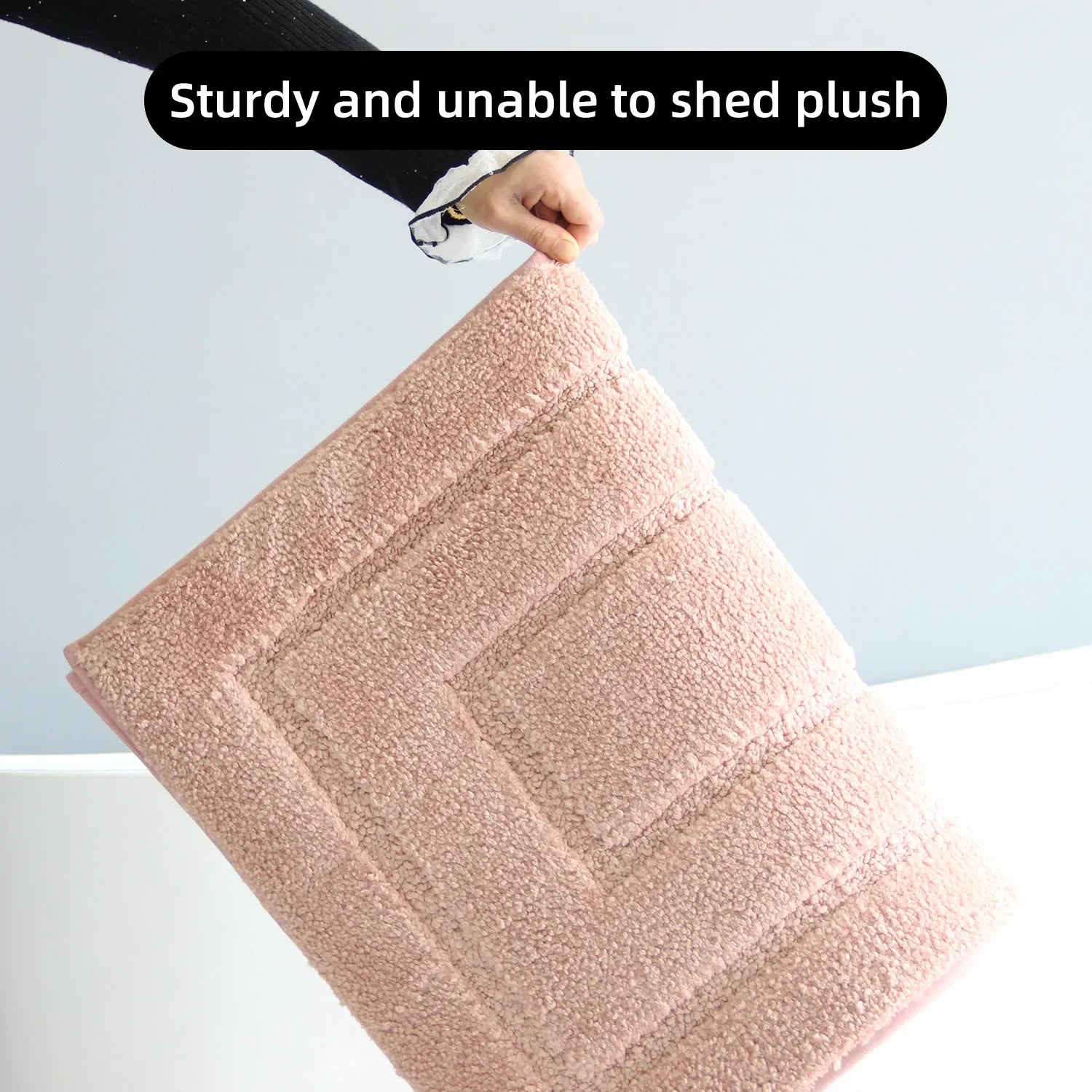 Nutshell plush bathroom floor mat with a sturdy design, perfect for adding comfort and style to your bathroom
