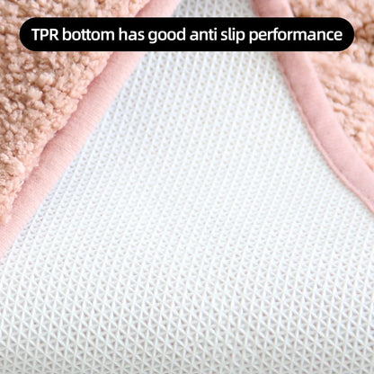 Plush bathroom floor mat with a soft surface and anti-slip TPR backing for safety and comfort