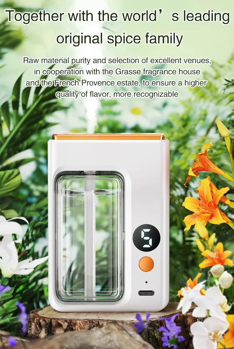 Nutshell portable diffuser with digital display and orange button surrounded by flowers for home fragrance