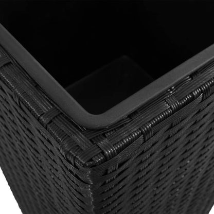 Close-up of Nutshell black rattan flower raised beds planter corner showing woven texture and inner lining
