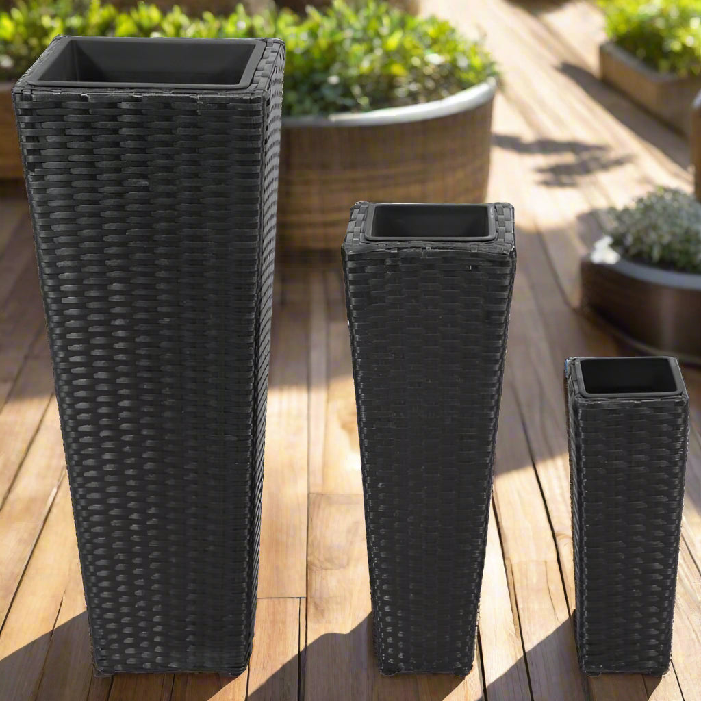 Nutshell black rattan flower raised beds planters in three different tall tapered sizes