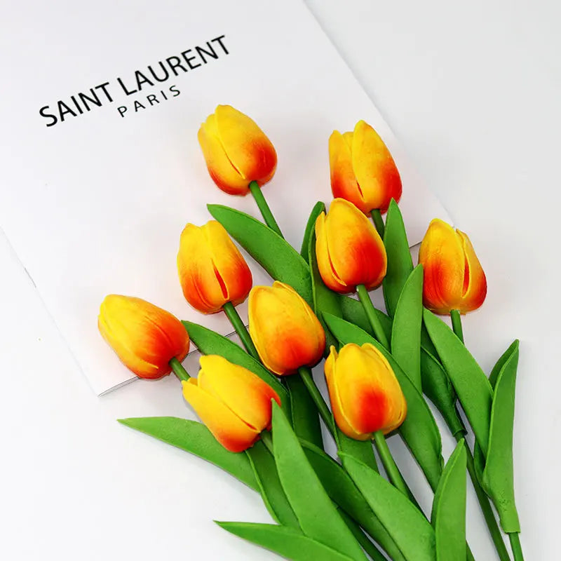 Realistic artificial tulip bouquet with vibrant orange and yellow blooms for home decor