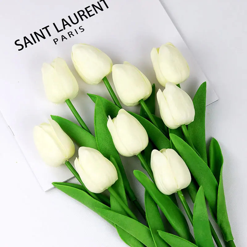Realistic artificial tulip bouquet in white with lush green leaves for stylish home decor