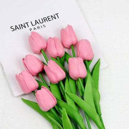 Realistic artificial tulip bouquet in pink with green leaves for home decor and special occasions