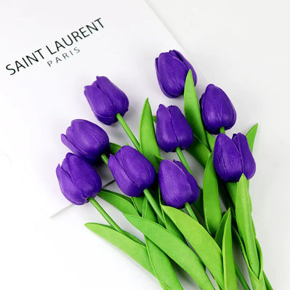 Realistic artificial tulip bouquet in purple with green leaves, perfect for home decor