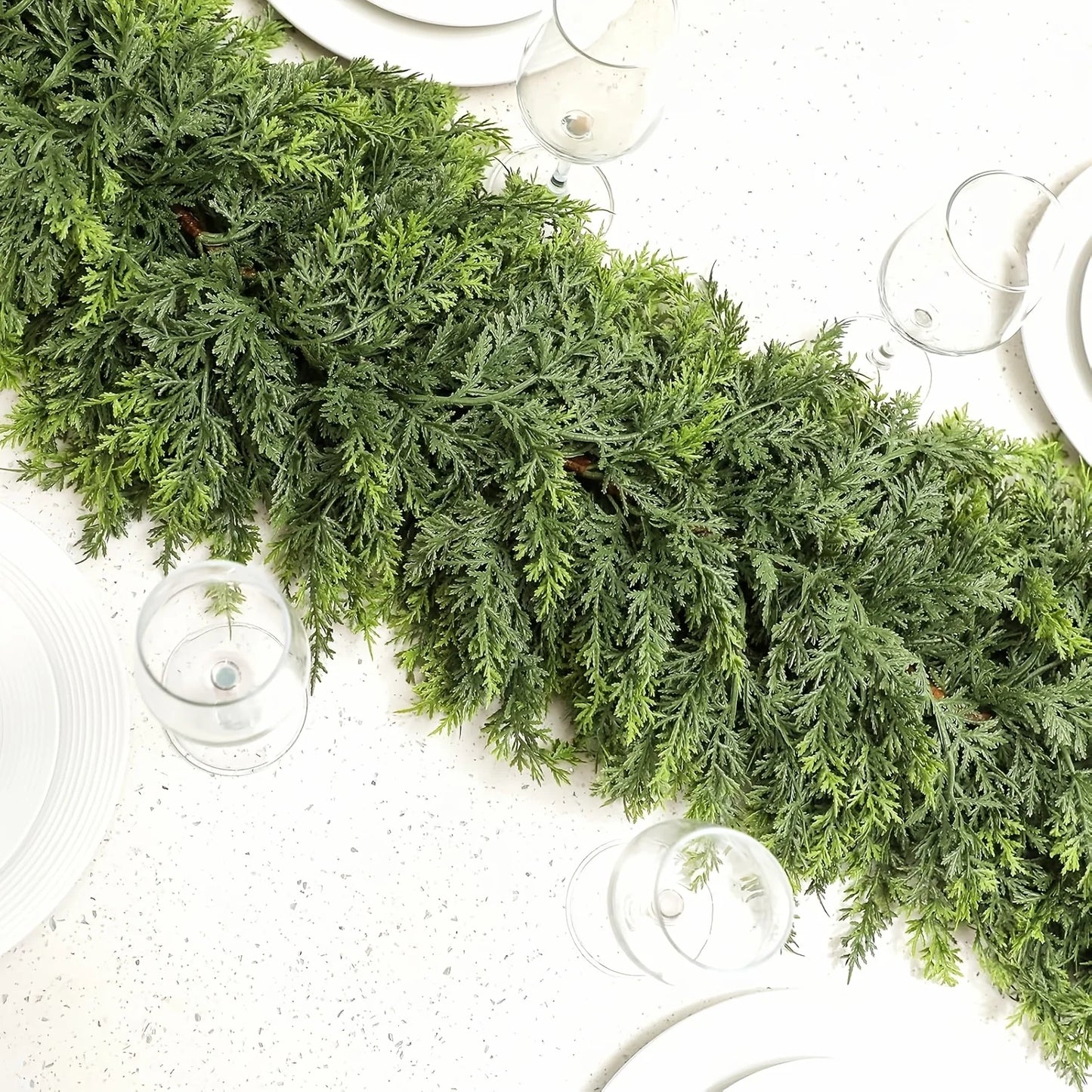 Realistic Christmas Garland displayed on a dining table with plates and glasses for holiday decor