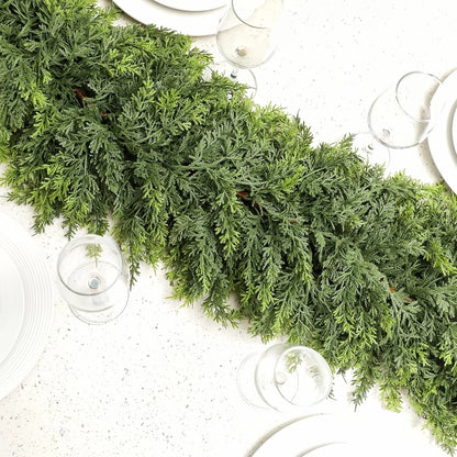 Realistic Christmas Garland displayed on a dining table with plates and glasses for holiday decor