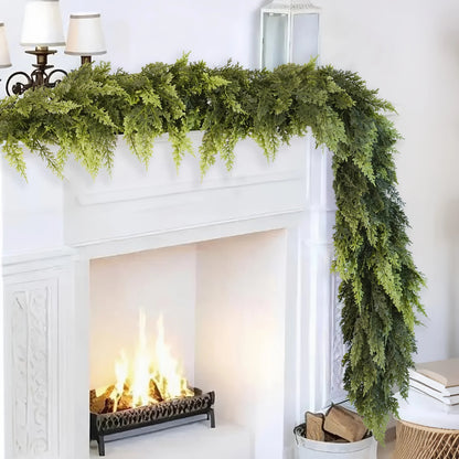 Realistic Christmas Garland draped over a mantel with a cozy fireplace in the background