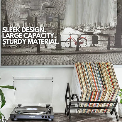 Nutshell Vinyl Record Storage black metal rack holding colorful records beside turntable in modern living room