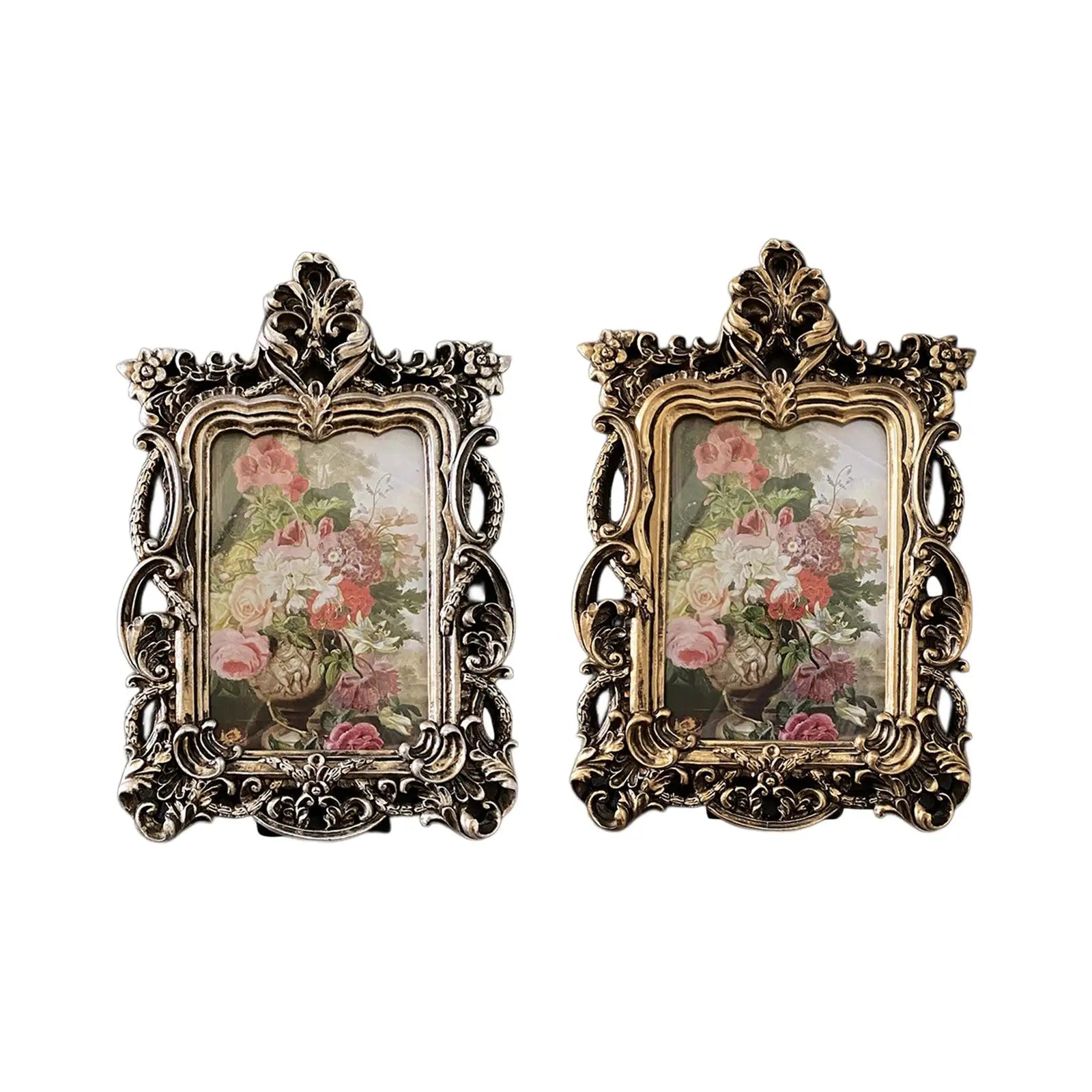 Set of two retro ornate photo frames in silver and gold featuring floral artwork