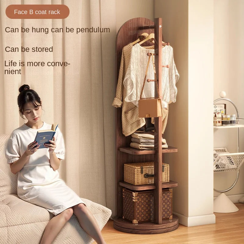 Nutshell Rotating Full Length Mirror on a coat rack with versatile storage for convenience