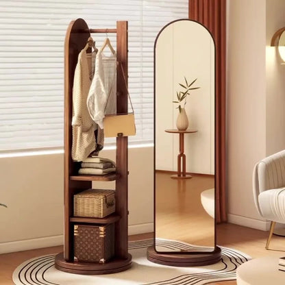 Nutshell Rotating Full Length Mirror with a stylish wooden frame and clothing storage features