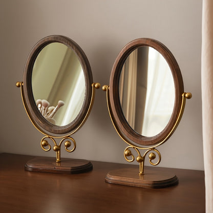 Nutshell rotating iron frame mirror featuring an elegant design with wooden accents