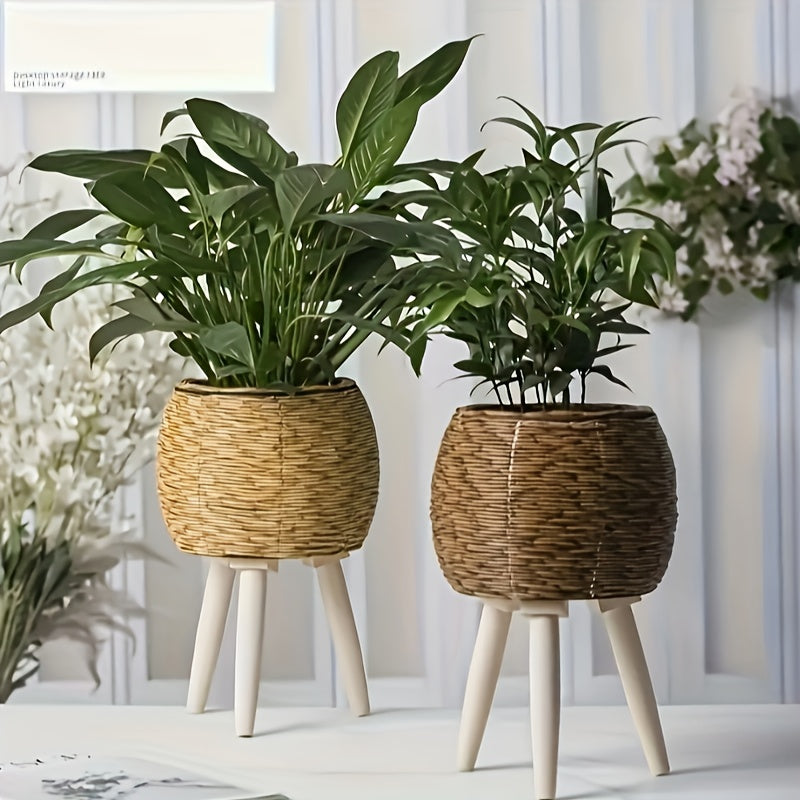 Round flower pot with wooden tripod showcasing vibrant green plants in a stylish home decor setting