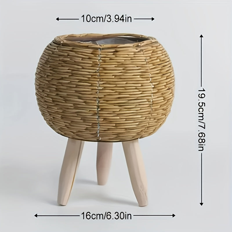 Round flower pot with wooden tripod, stylish design for indoor plants and home decor