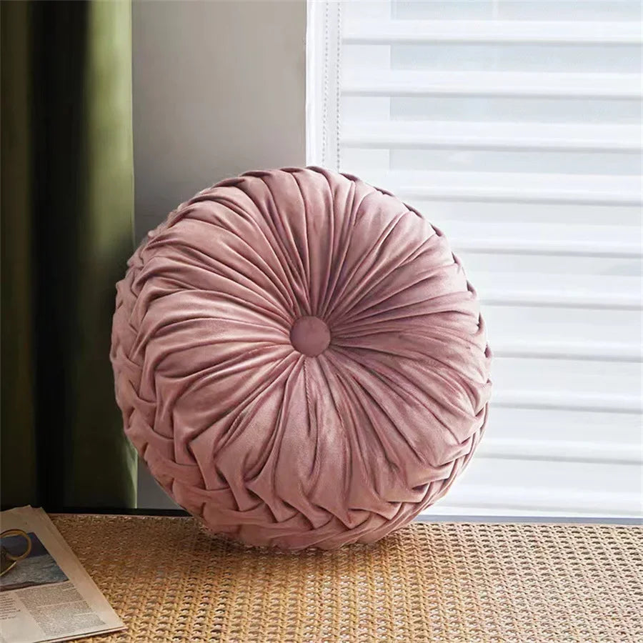 Nutshell round pumpkin pillow in soft mauve velvet with pleated design as decorative cushion