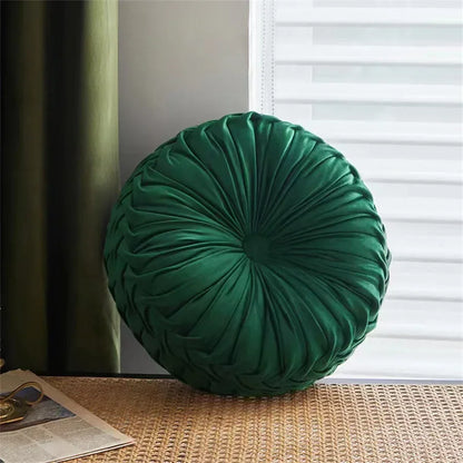 Nutshell round pumpkin pillow in dark green velvet with gathered pleats for decorative cushion