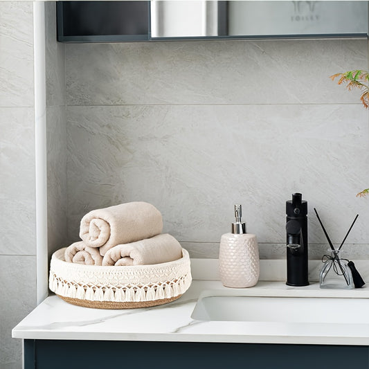 Nutshell rustic storage basket with decorative fringe, perfect for organizing towels in modern bathrooms