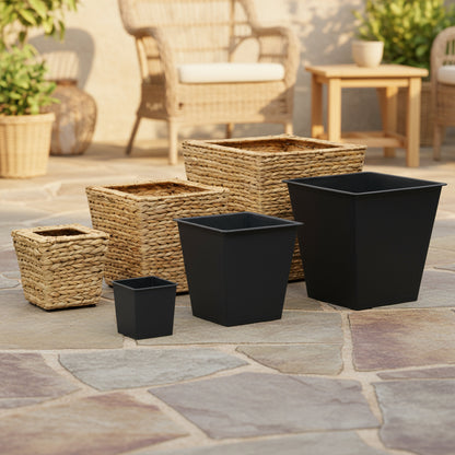 Set of rustic water hyacinth planters in various sizes for indoor and outdoor decor