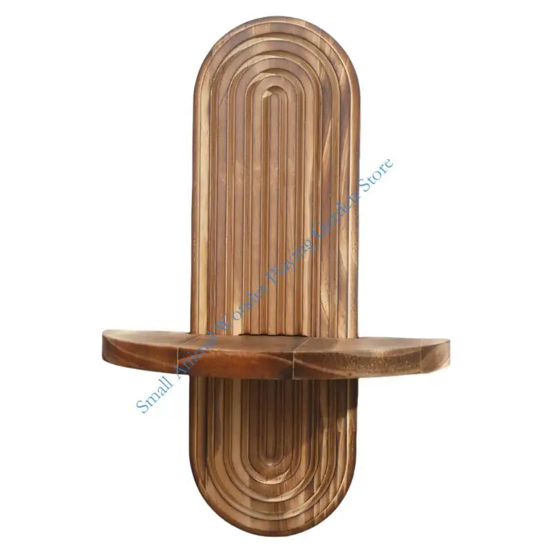 Nutshell wooden wall shelf with rounded arched grooved backboard and single floating shelf in natural wood finish