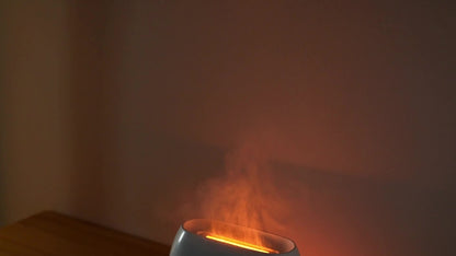 Nutshell salt stone flame diffuser emitting soothing aromatherapy mist with soft glowing light