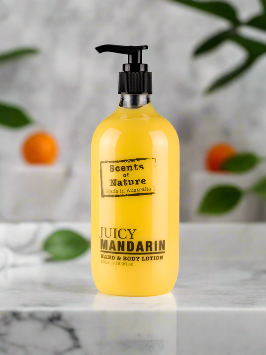 Nutshell Juicy Mandarin hand and body lotion in yellow bottle with pump labeled Scents of nature Body Lotion