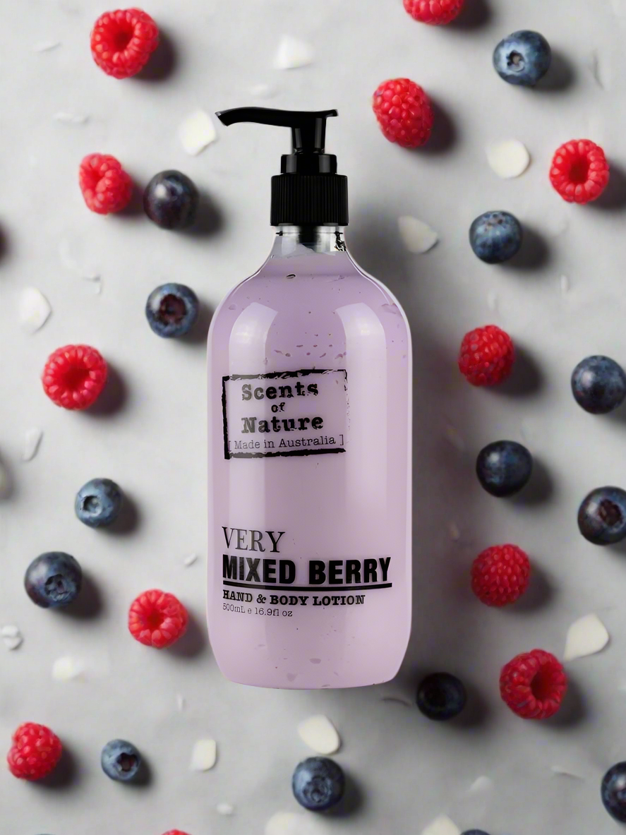 Nutshell Scents of nature Body Lotion mixed berry hand and body cream with pump bottle surrounded by berries