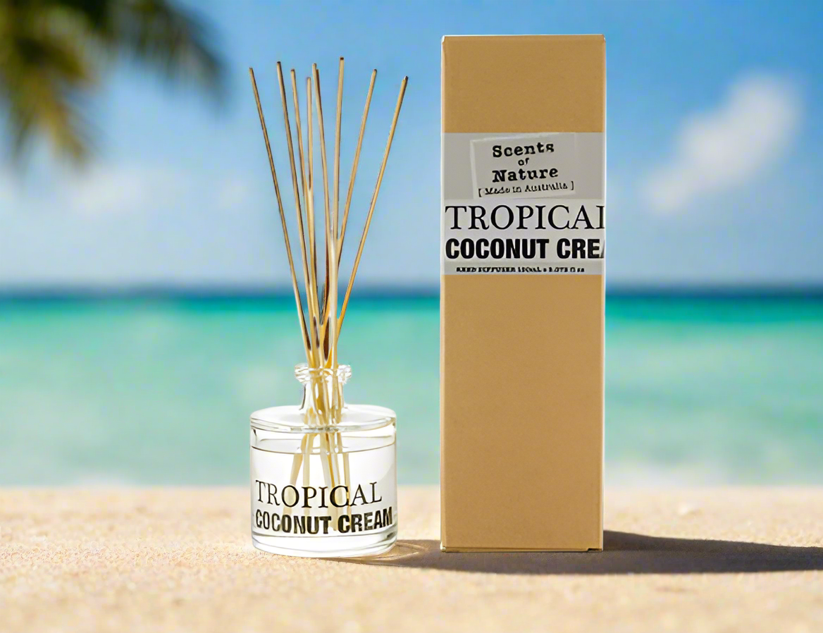 Scents of Nature Reed Diffuser 150mL tropical coconut cream scent with reeds and packaging on beach background