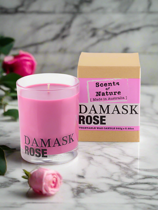 Scents of Nature Soy Candle 240g Damask Rose scent pink candle in glass with packaging and rose flowers