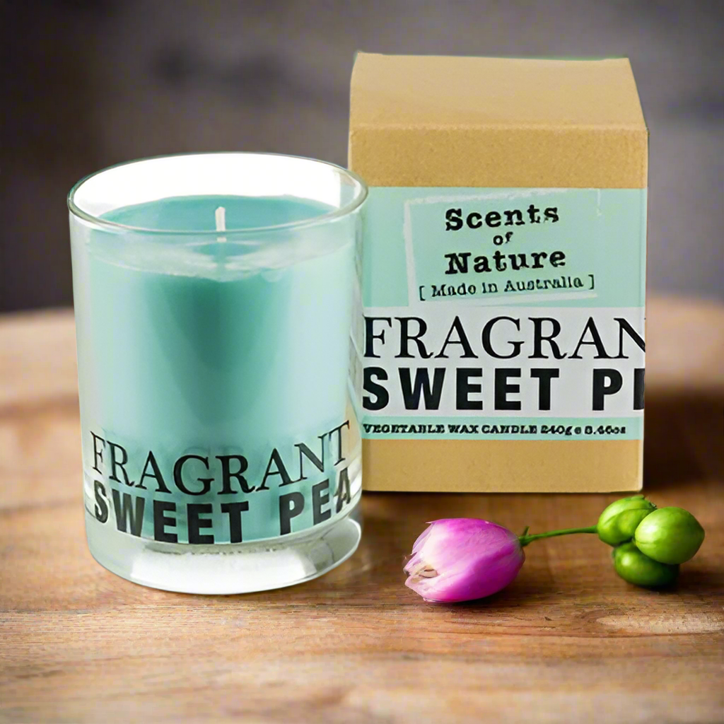 Scents of Nature Soy Candle 240g Sweet Pea fragrance in a glass jar with packaging and decorative flowers