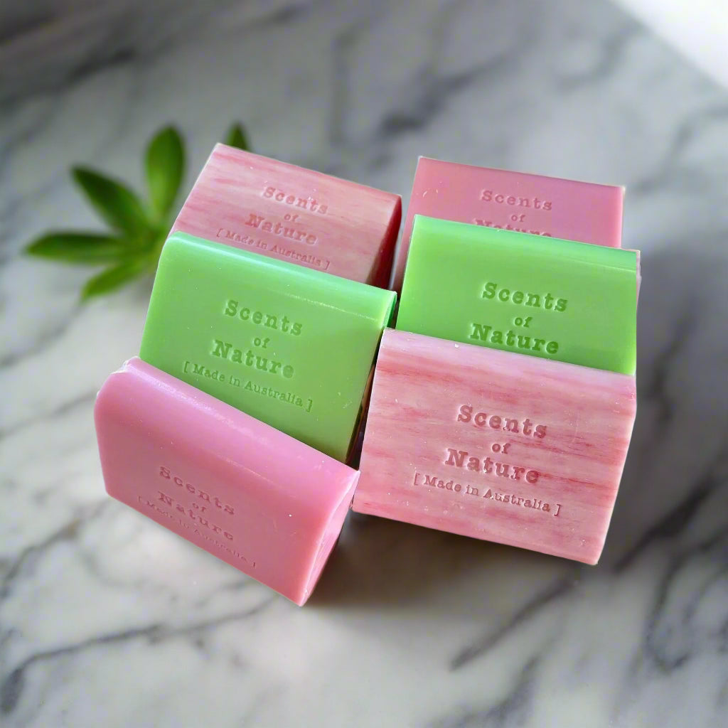 Nutshell Tilley Soap Bars six pink and green Scents of Nature artisan soap bars arranged on marble