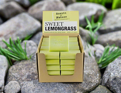 Nutshell Tilley Soap Bars Sweet Lemongrass green soap display in cardboard box on stones with herbs
