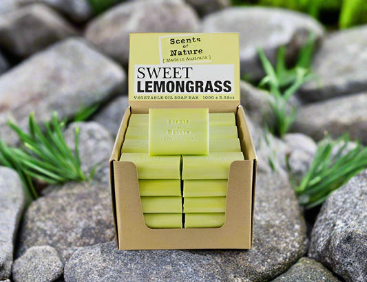 Nutshell Tilley Soap Bars Sweet Lemongrass green soap display in cardboard box on stones with herbs