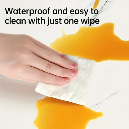 Self-adhesive decorative tiles shown being cleaned easily with one wipe, highlighting waterproof feature