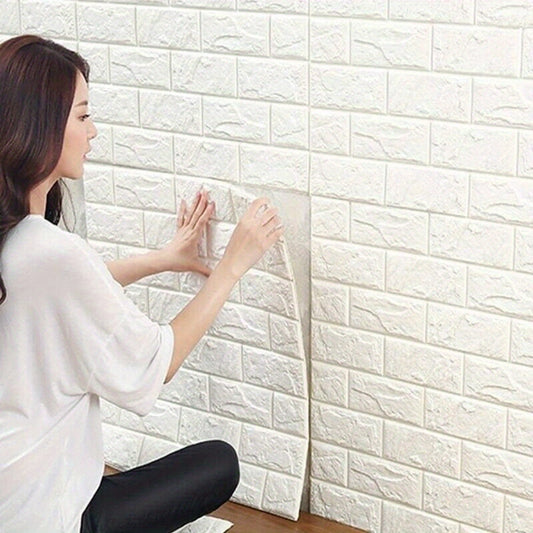 Woman applying self-adhesive wall tile to create a stylish brick wall design in home decor