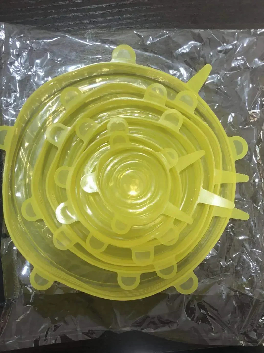 Set of Yellow Silicone Stretch Lids in Various Sizes for Food Storage and Leftovers