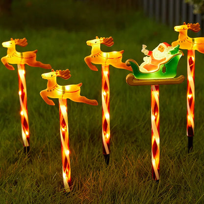 Decorative solar Christmas pathway lights with Santa in a sleigh and reindeer for festive outdoor decor