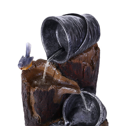 Nutshell solar fountain water feature with cascading water pots and decorative bird detail