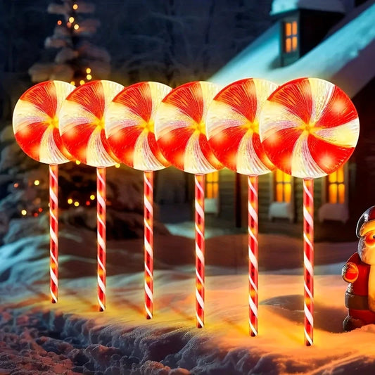 Solar powered candy cane outdoor lights in festive red and white design for holiday decoration