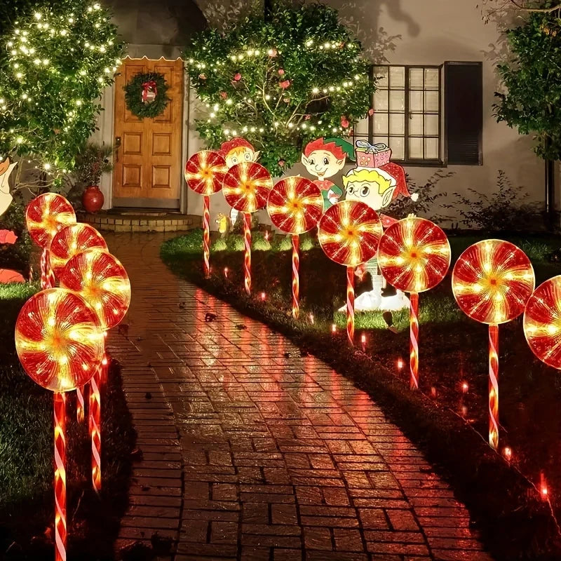 Bright solar powered candy cane outdoor lights lining a festive walkway for holiday decoration