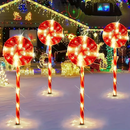 Solar powered candy cane outdoor lights with red and white stripes for festive holiday decoration