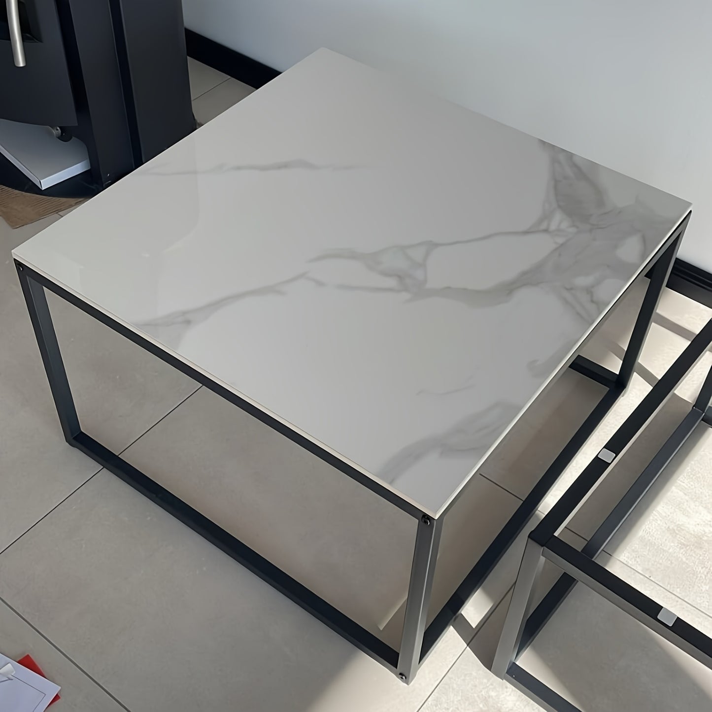 Square Nesting Coffee Table Set with a sleek marble surface and modern metal frame