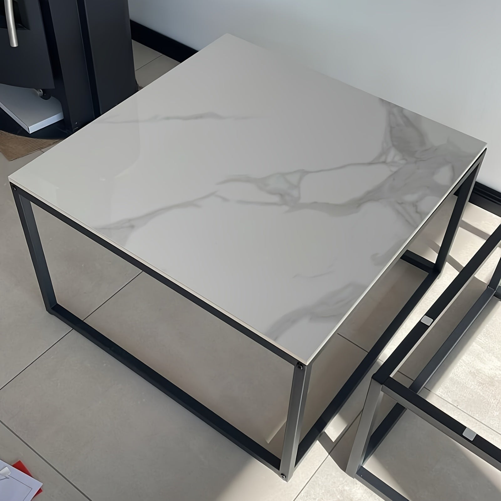 Square Nesting Coffee Table Set with a sleek marble surface and modern metal frame