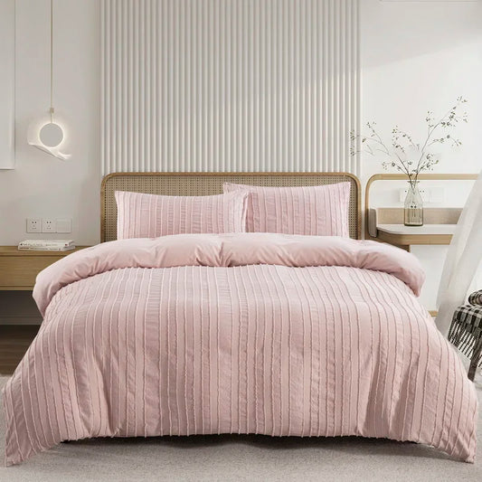 Nutshell pink striped duvet cover set on a bed with matching pillowcases in a modern bedroom