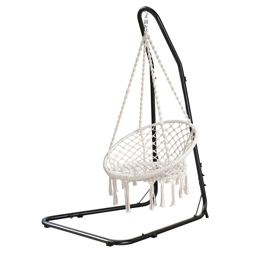 Nutshell white macrame hammock chair with stand on black metal frame with tassels for indoor outdoor use