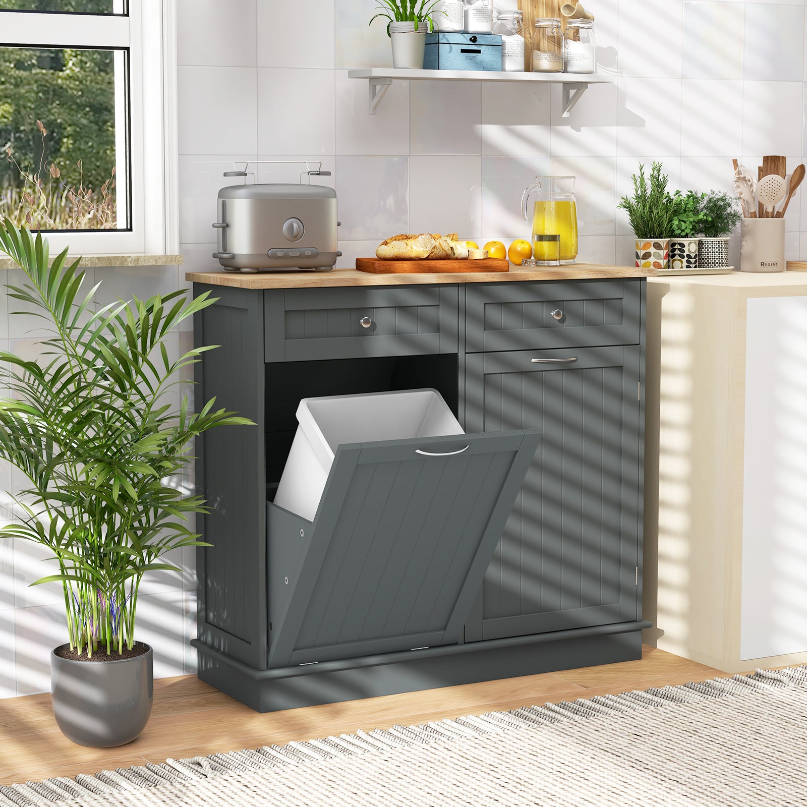 Nutshell tilt-out trash cabinet with a sleek design and easy access for kitchen organization