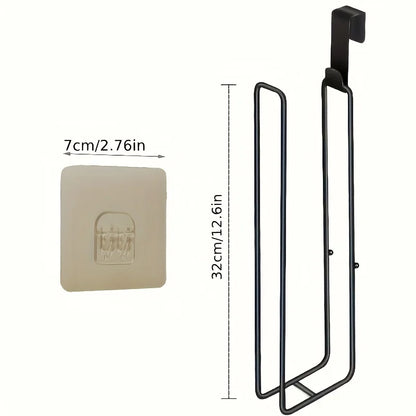 Nutshell Toilet Paper Holder in black metal with sleek design for modern bathrooms