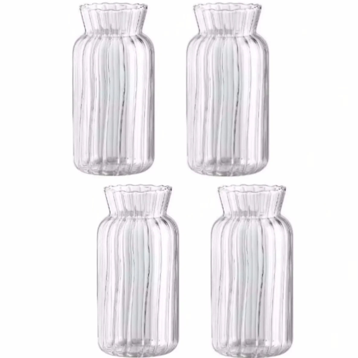 Set of four transparent glass vases for flowers with ribbed design, perfect for floral arrangements